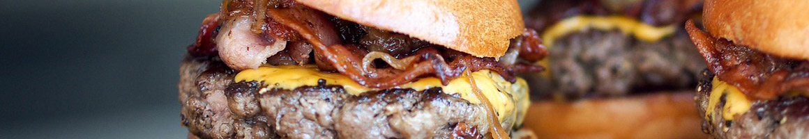 Eating American (New) Burger at Freddy's Frozen Custard & Steakburgers restaurant in Omaha, NE.